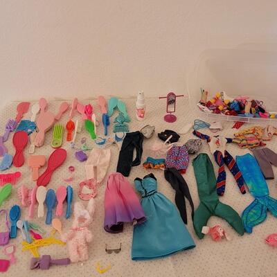 Lot 264: Vintage Barbie Clothes, Brushes, Hangers, Jewelry, Purses, Accessories & Shoes (have not matched them up)