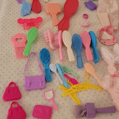 Lot 264: Vintage Barbie Clothes, Brushes, Hangers, Jewelry, Purses, Accessories & Shoes (have not matched them up)