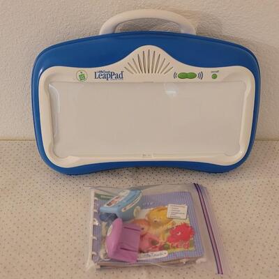 Lot 274: Leap Pad with Cartridges and Book