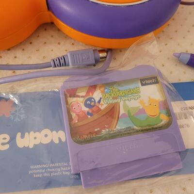 Lot 279: VTech V.Smile TV Learning System & Cartridges 