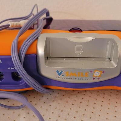 Lot 279: VTech V.Smile TV Learning System & Cartridges 
