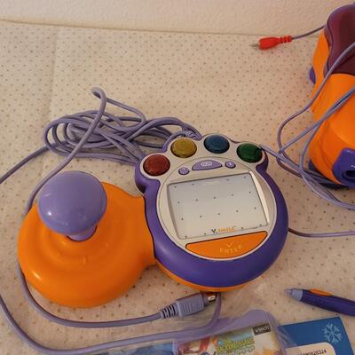 Lot 279: VTech V.Smile TV Learning System & Cartridges 