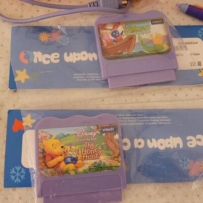 Lot 279: VTech V.Smile TV Learning System & Cartridges 