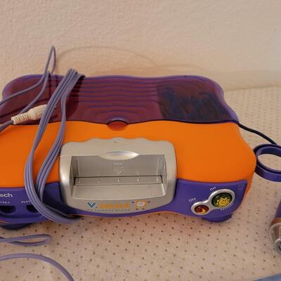 Lot 279: VTech V.Smile TV Learning System & Cartridges 
