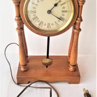 Lot #269  Vintage Electric Clock in the Colonial Style