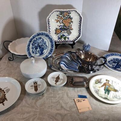 Lot 98 Collectible plates, Chinese soup spoons ceramic, casserole holder.