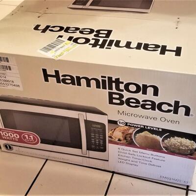 Lot #294  Hamilton Beach Stainless Microwave New in Box