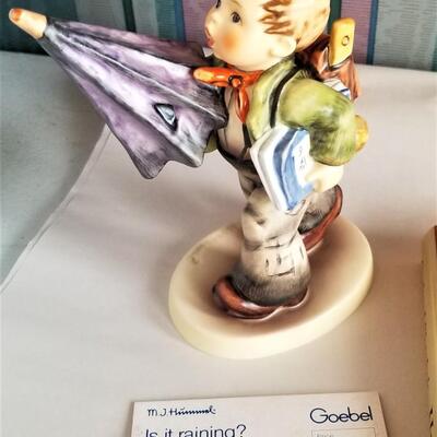 Lot #304  Hummel Lot - Figurine and Autographed Book