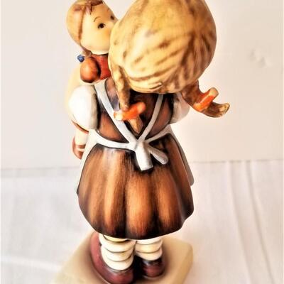 Lot #306  HUMMEL figurine  "Kiss me!"