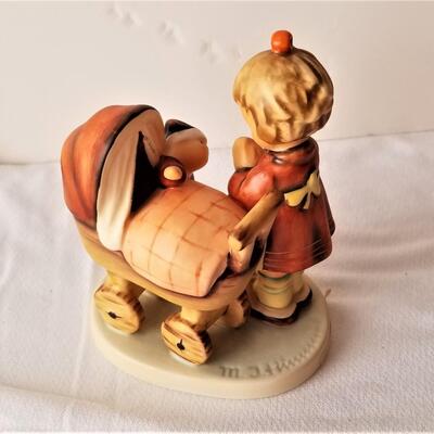 Lot #331  HUMMEL figurine "Doll Mother"