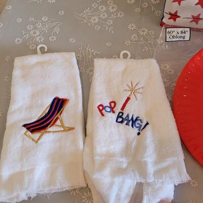 Lot 33: Plastic Plates, Tablecloth and Towels