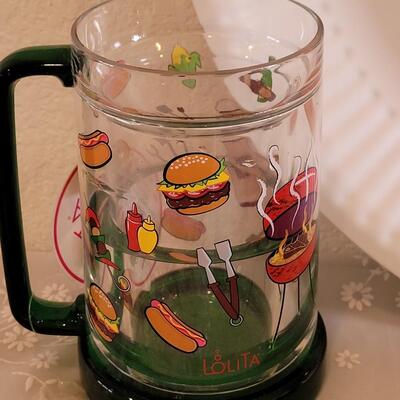 Lot 35: Summer Cookout Large Platter, Tablecloth, Lolita Freezer Mug and Food & Condiments Candles