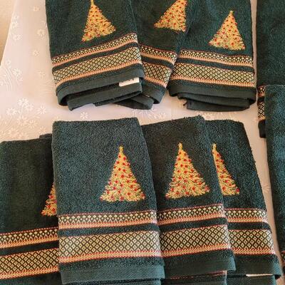 Lot 44: Christmas (4) Handtowels and (7) Fingertip Towels