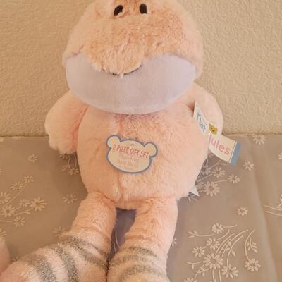 Lot 47: (2) New Pink Baby Plushies with Socks & Bib for Baby