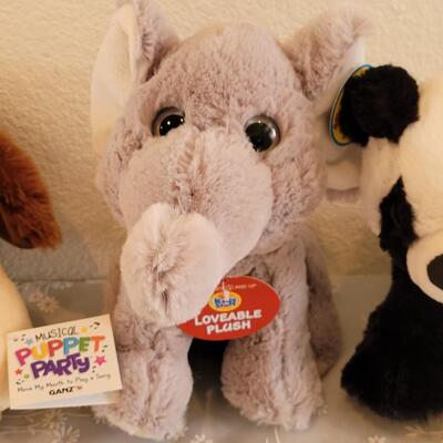 Lot 49: New Musical Puppy Puppet, Elephant & Panda Plushies 