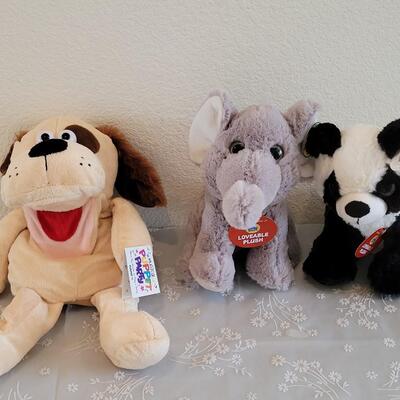 Lot 49: New Musical Puppy Puppet, Elephant & Panda Plushies 