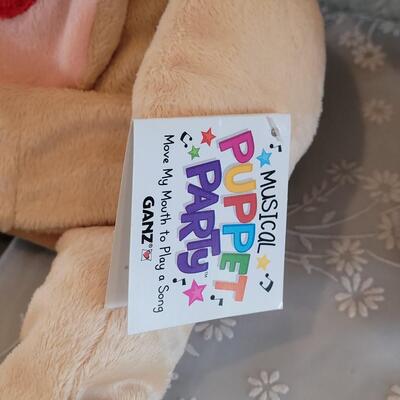 Lot 49: New Musical Puppy Puppet, Elephant & Panda Plushies 