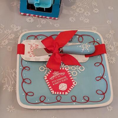 Lot 62: (2) Holiday Plates with Spreaders, Sprinkle Bell and Cookie Cuttet Wheel