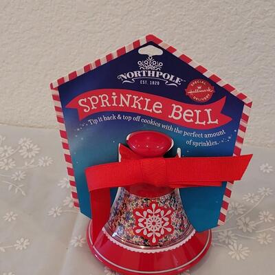 Lot 62: (2) Holiday Plates with Spreaders, Sprinkle Bell and Cookie Cuttet Wheel