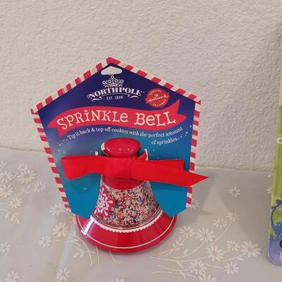 Lot 64: (2) Holiday Plates with Spreaders, Sprinkle Bell and Mickey Cookie Set