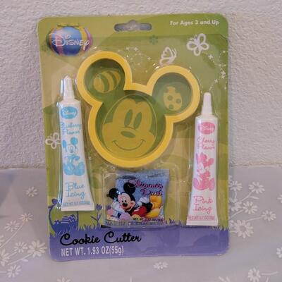 Lot 64: (2) Holiday Plates with Spreaders, Sprinkle Bell and Mickey Cookie Set