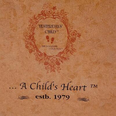 Lot 82: A Child's Heart Figurine 