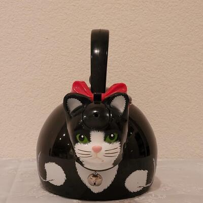 Lot 91: Vintage Cat Tea Kettle (has a lot of wear on the inside) 
