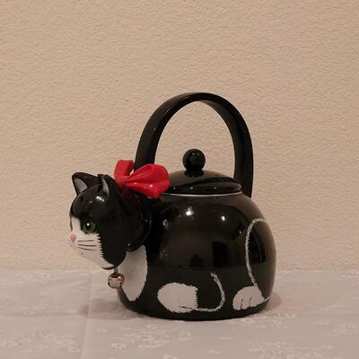 Lot 91: Vintage Cat Tea Kettle (has a lot of wear on the inside) 