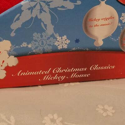 Lot 102: Animated Mickey and Animated Sledding Minnie 