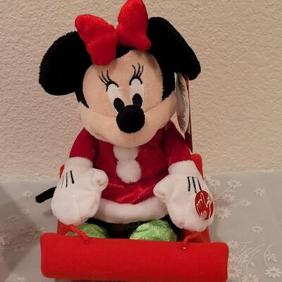 Lot 102: Animated Mickey and Animated Sledding Minnie 