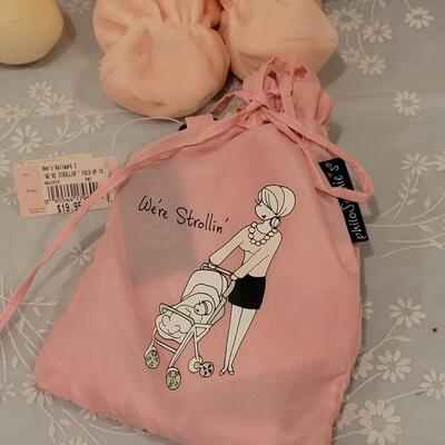 Lot 104: New Baby Girl Plushies, Praying Doll, Stroller Cover and Socks 