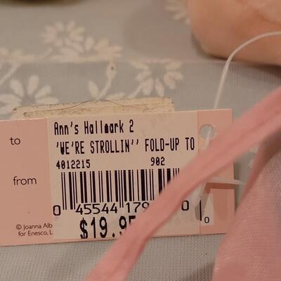 Lot 104: New Baby Girl Plushies, Praying Doll, Stroller Cover and Socks 