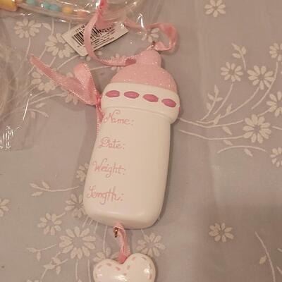 Lot 107: New Baby Girl Rattles, Musical Rabbit, Plushies, Ornament, Giraffe Curl Trinket Box and Magnet