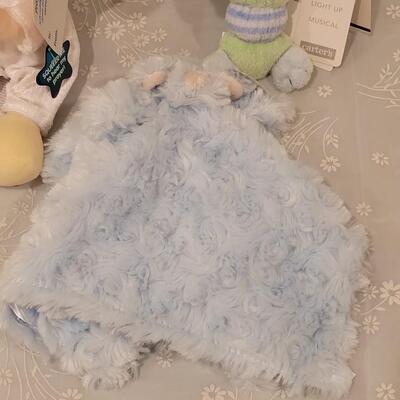 Lot 105: New Baby Boy Plushies, Praying Boy Doll and Musical Bears