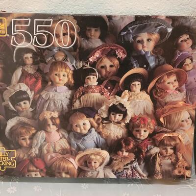 Lot 116: (2) Doll Puzzles (Springboc & Golden)