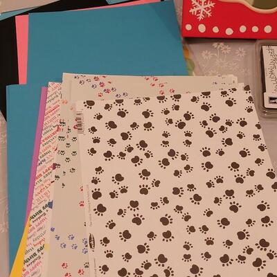 Lot 166: Crafting Lot - Rubber Stamps, Scrapbook Paper, Glue Sticks, Roller and a Holiday Planner