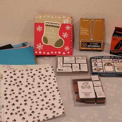 Lot 166: Crafting Lot - Rubber Stamps, Scrapbook Paper, Glue Sticks, Roller and a Holiday Planner