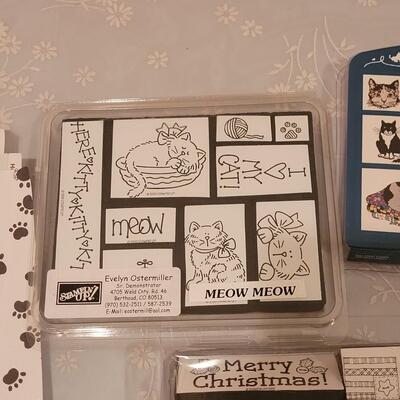 Lot 166: Crafting Lot - Rubber Stamps, Scrapbook Paper, Glue Sticks, Roller and a Holiday Planner
