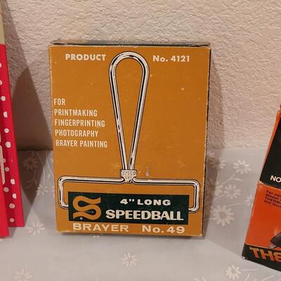 Lot 166: Crafting Lot - Rubber Stamps, Scrapbook Paper, Glue Sticks, Roller and a Holiday Planner