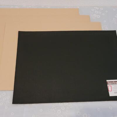 Lot 175: (4) New Tan/Black Leather Placemats 
