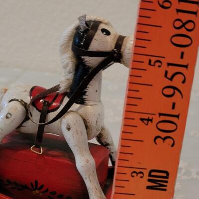 Lot 204: Vintage Enesco Music Box Rocking Horse