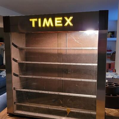 Lot 248: Vintage TIMEX Display Cabinet w/ Lights and Moving Shelves - TESTED A+