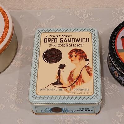 Lot 257: Vintage Oreo, Norman Rockwell and Amish Scene Tins