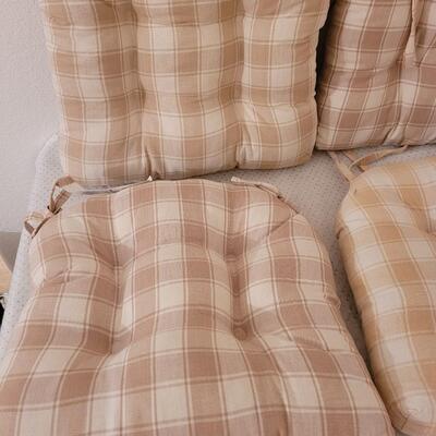 Lot 286: Set of 4 Tie On Seat Cushions (one is lighter than the others)