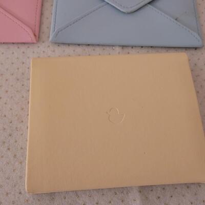 Lot 300: Photo Envelopes and Album 