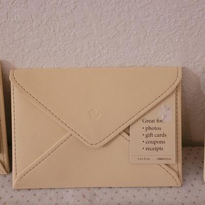 Lot 300: Photo Envelopes and Album 