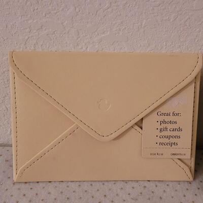 Lot 300: Photo Envelopes and Album 