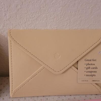 Lot 300: Photo Envelopes and Album 