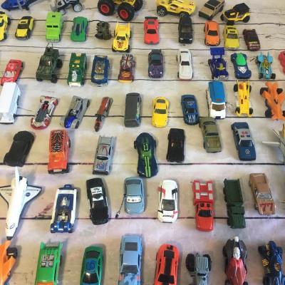 Lot of cars and trucks 76 total