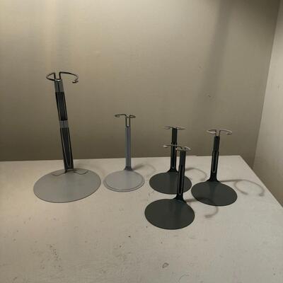 Lot 38 - (5) Metal Doll Stands